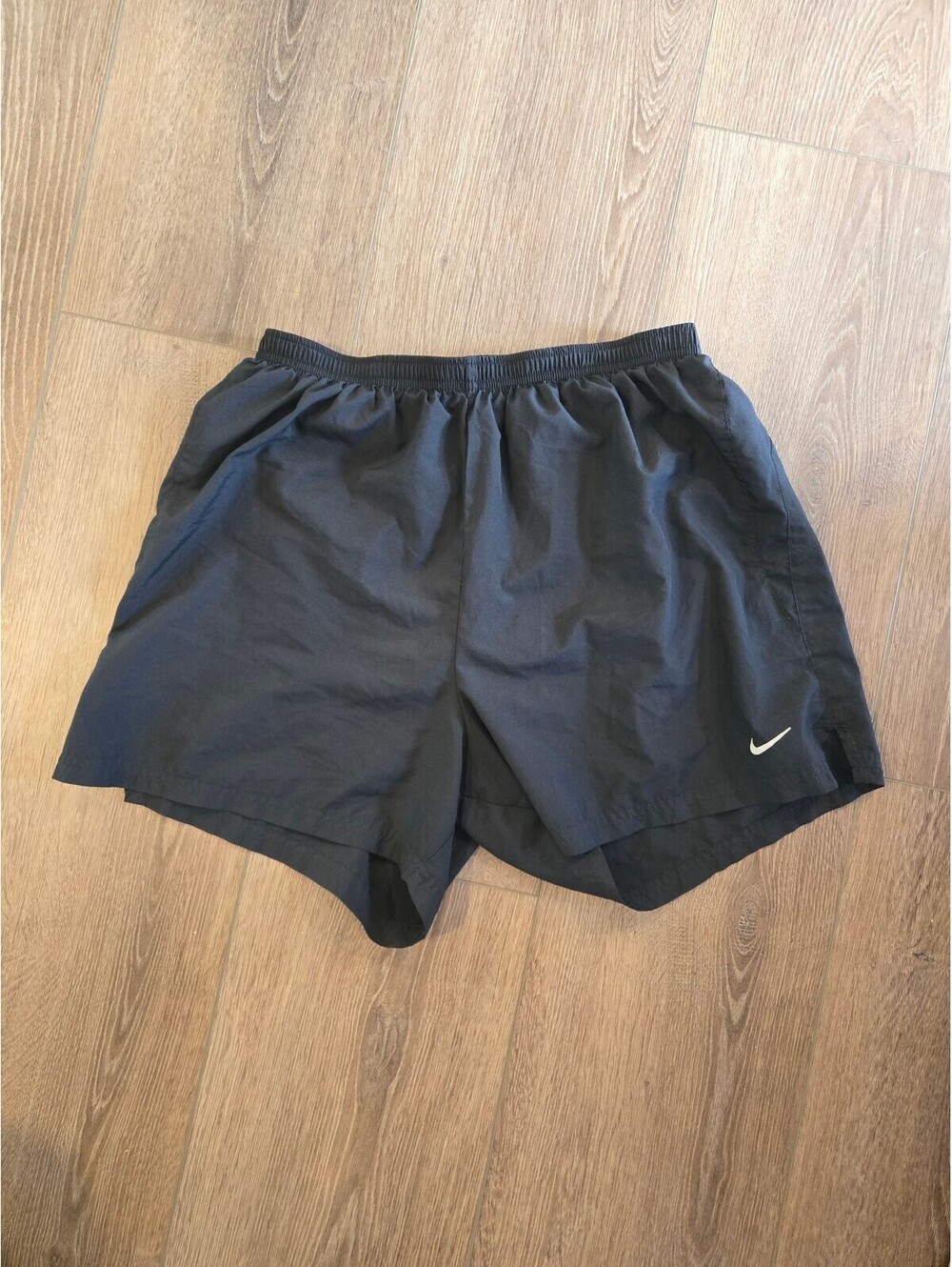 Black Nike running shorts